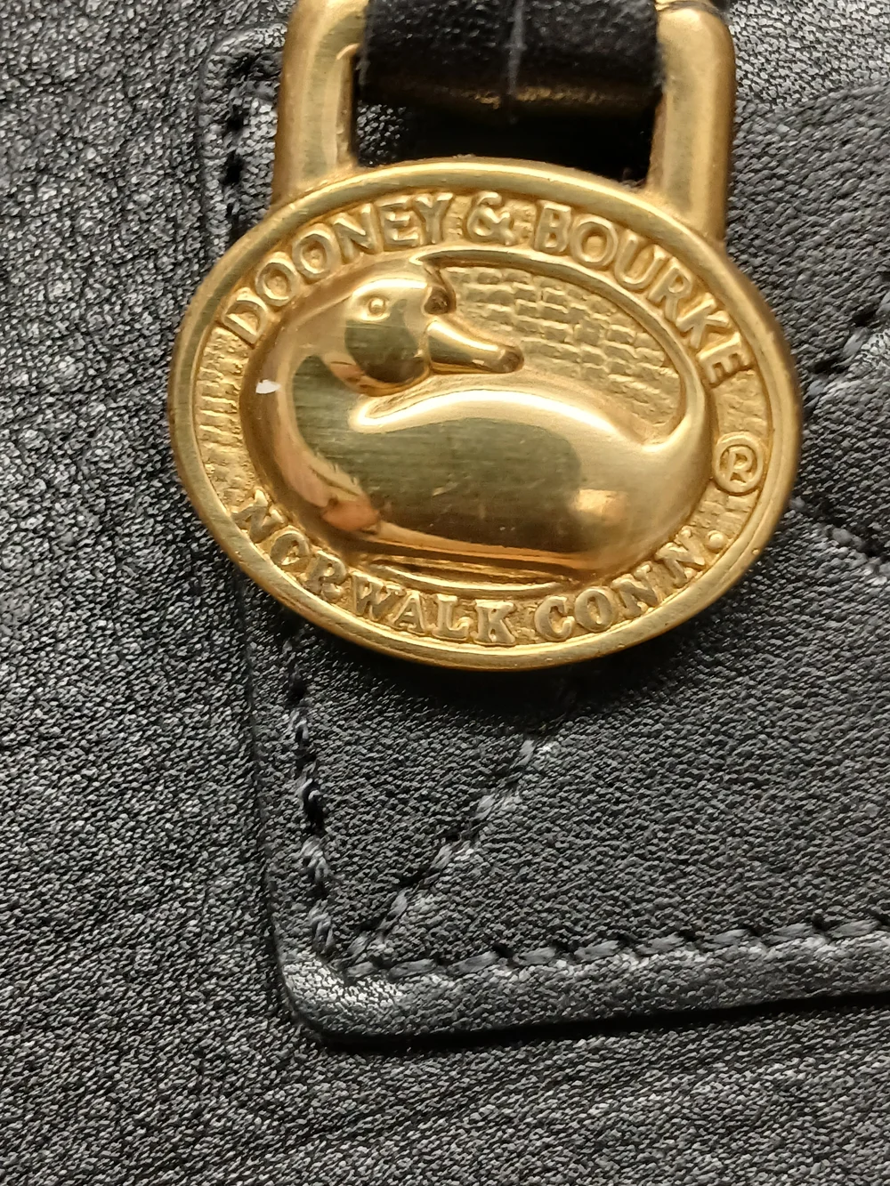 Dooney & Bourke Black Leather Tote with Gold Charm